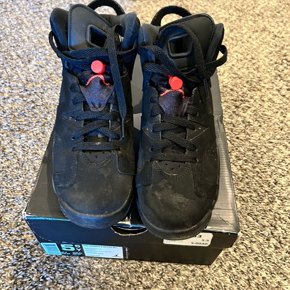 Black High-Top Sneakers with Red Accents
